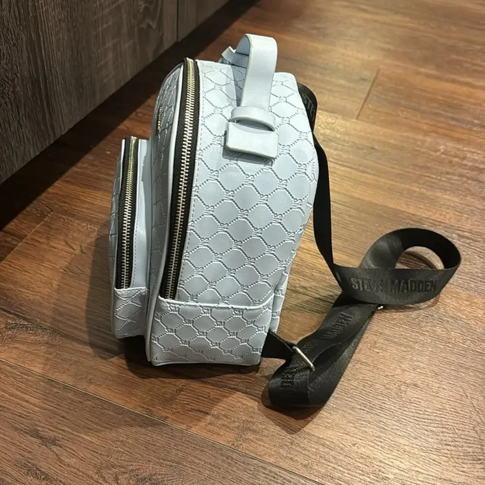 Steve Madden NWT Sky BBLogo Backpack w/front zip pocket and adjustable straps.